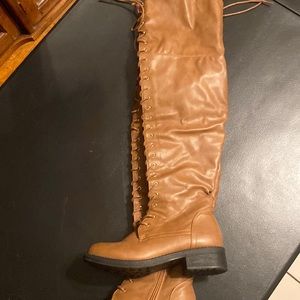 Gorgeous thigh high lace up boots purchased at local boutique.